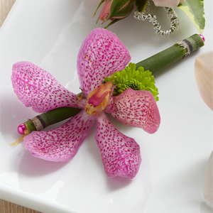 The FTD Pink Mokara Boutonniere
